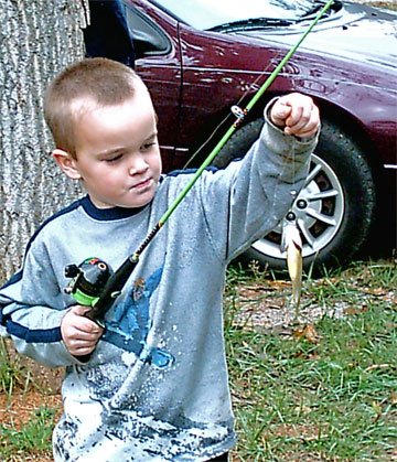 Jacob's first time ever catching a fish!!! W