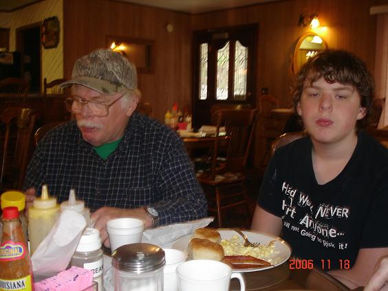ArkieRon and his son, Andrew at the hotel restaurant.JPG
